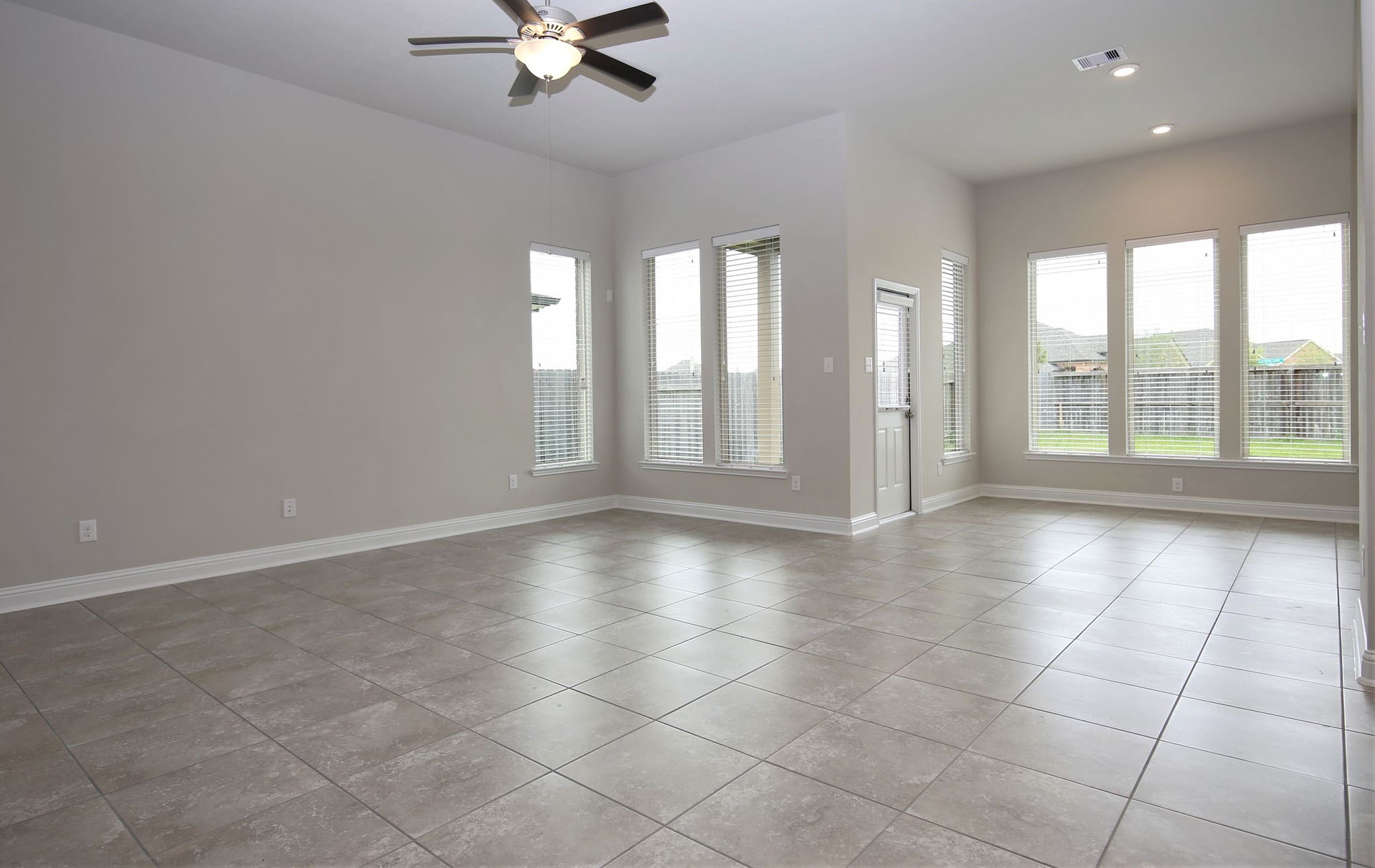 8218 Oxbow Manor Lane Cypress, TX 77433 - Photo 10 of 37 a view of an empty room with a window