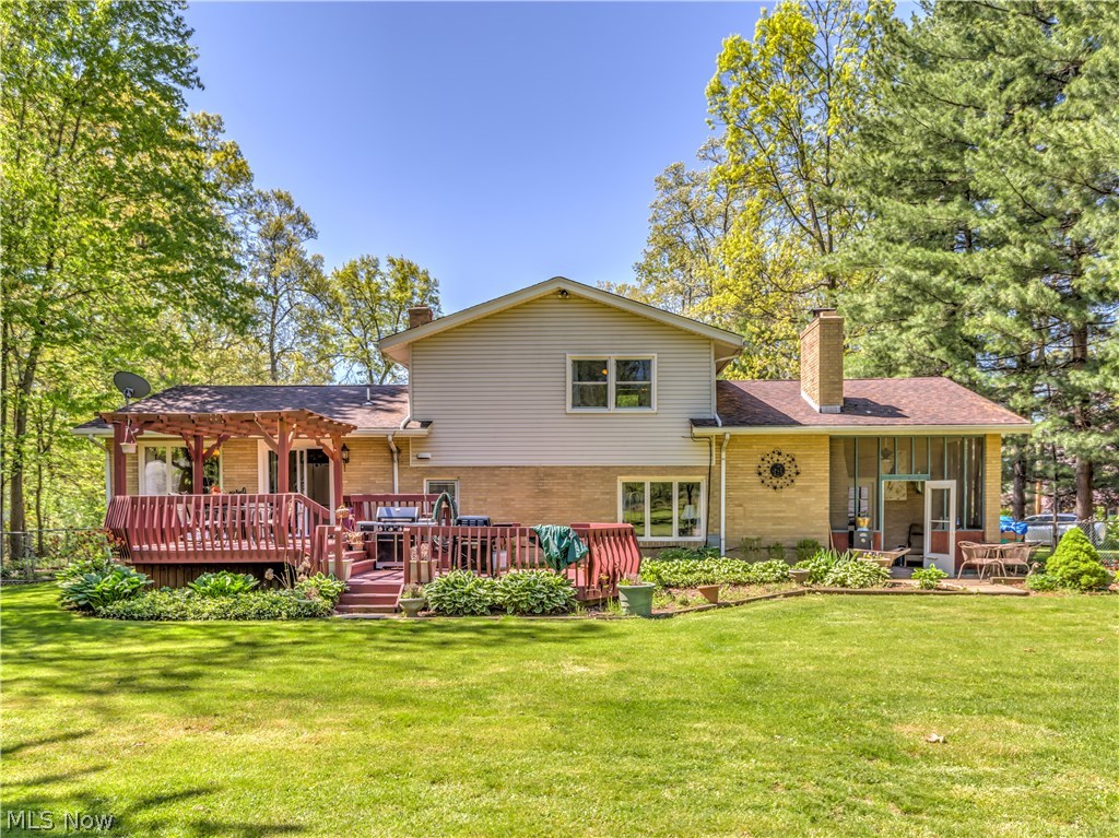 475 Yager Road Clinton, OH 44216 - Photo 5 of 24 Back view with 2 tier deck and screened porch*