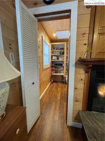 a room with a walk in closet and a window