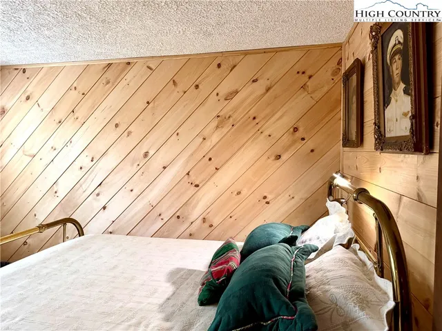 a view of a balcony with wooden floor