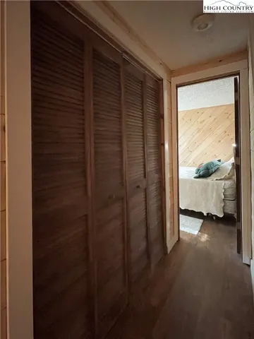 a view of a patio with table and chairs and wooden floor