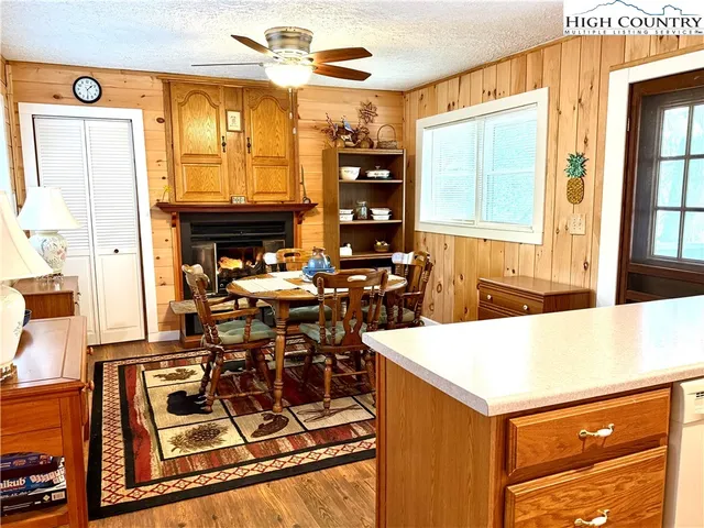 a view of a kitchen with furniture and a window