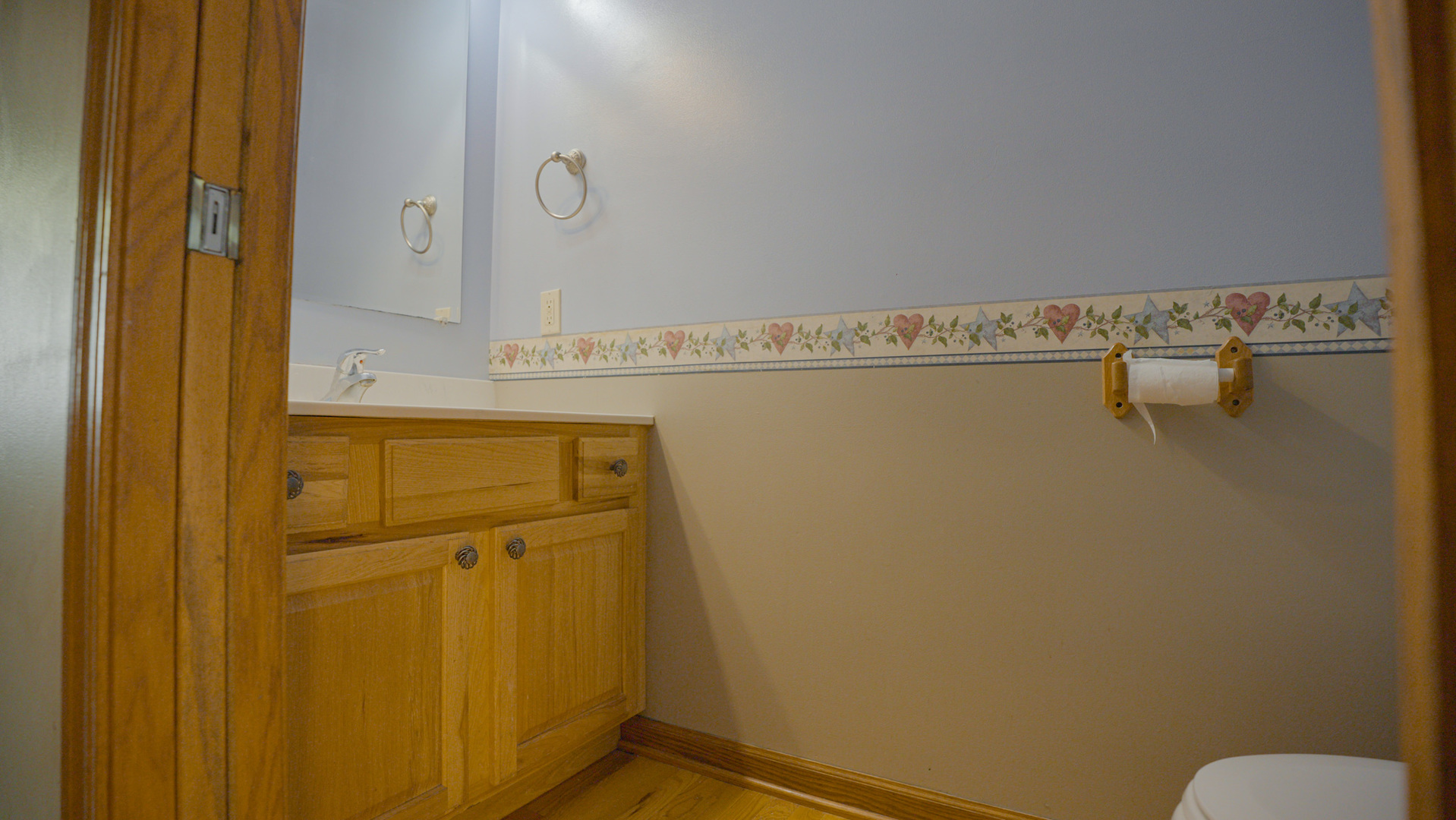 9282 East Hemstock Road Rochelle, IL 61068 - Photo 14 of 68 a bathroom with a granite countertop sink and mirror