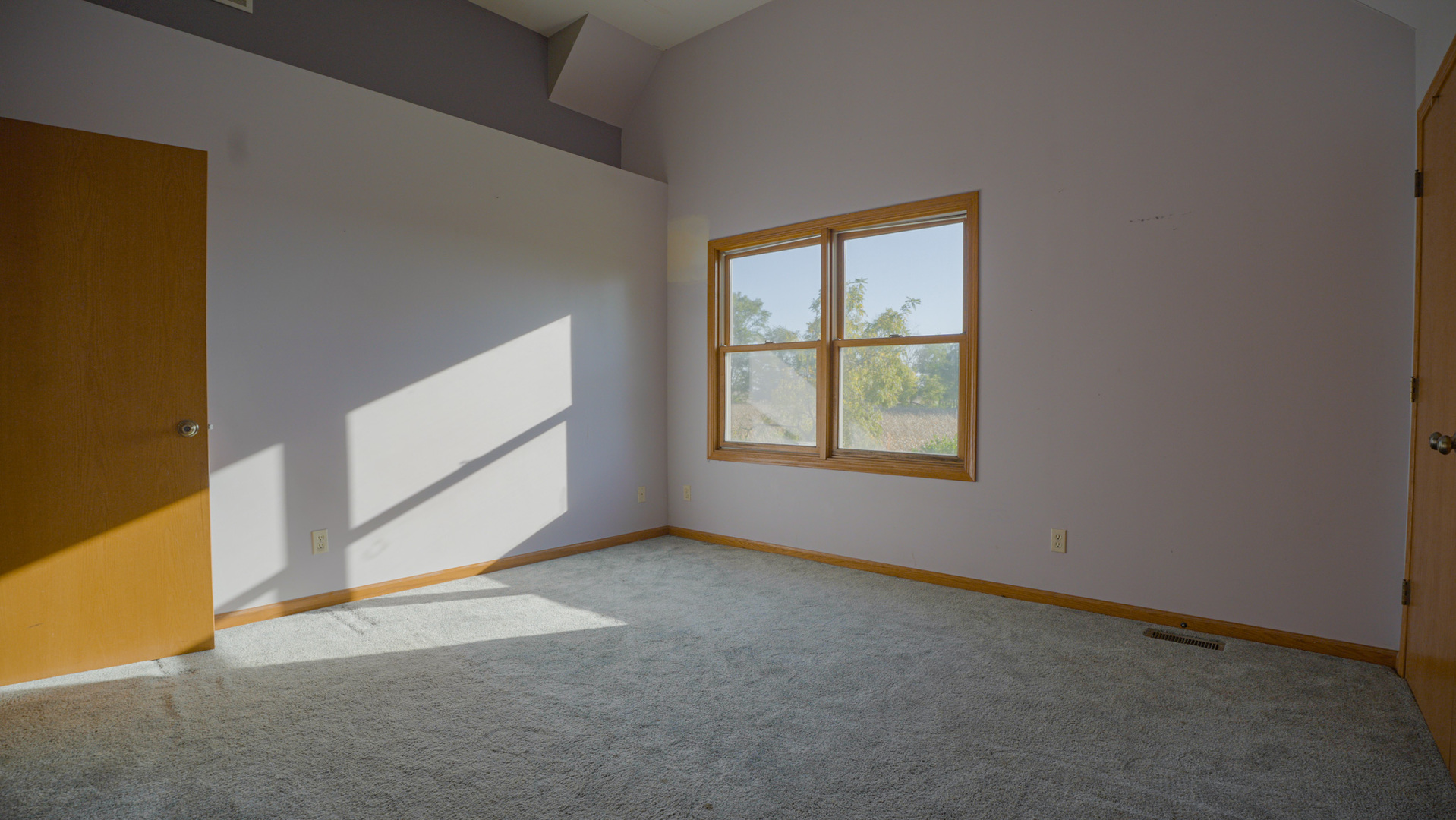 9282 East Hemstock Road Rochelle, IL 61068 - Photo 18 of 68 a view of an empty room with a window