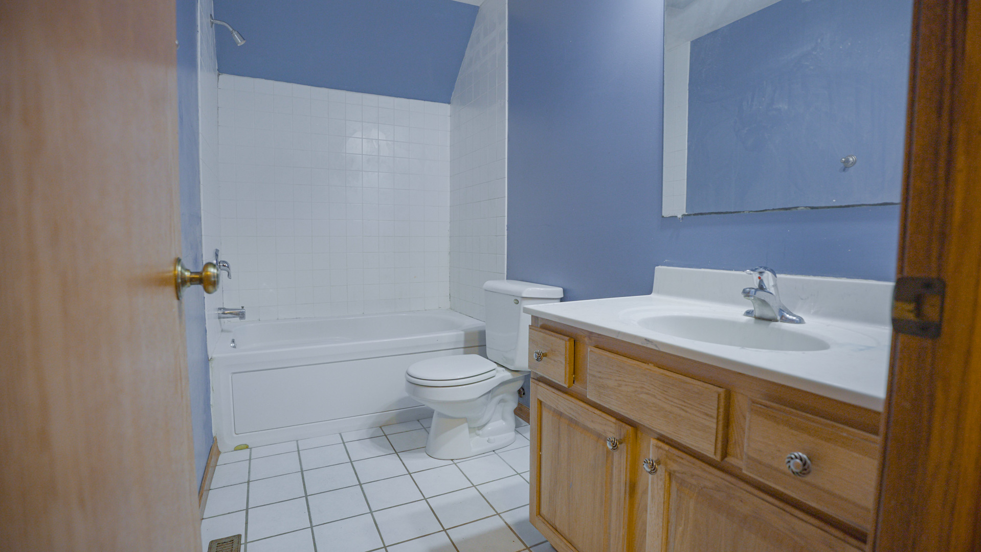 9282 East Hemstock Road Rochelle, IL 61068 - Photo 28 of 68 a bathroom with a granite countertop toilet sink and mirror