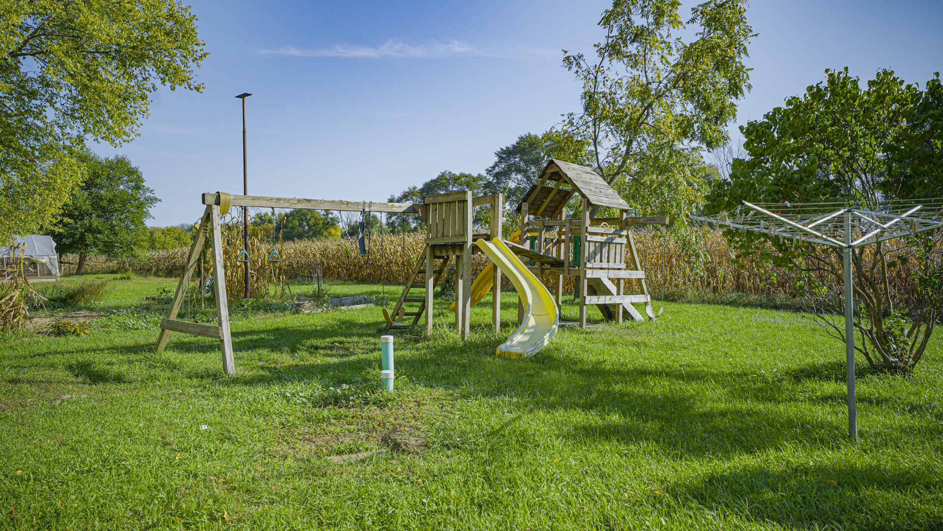 9282 East Hemstock Road Rochelle, IL 61068 - Photo 36 of 68 a view of a park with a slide