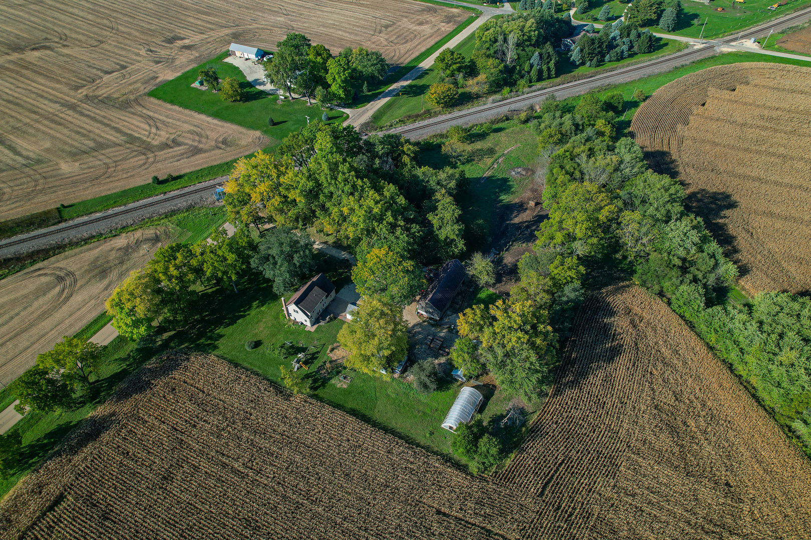 9282 East Hemstock Road Rochelle, IL 61068 - Photo 45 of 68 a view of a garden with a pathway