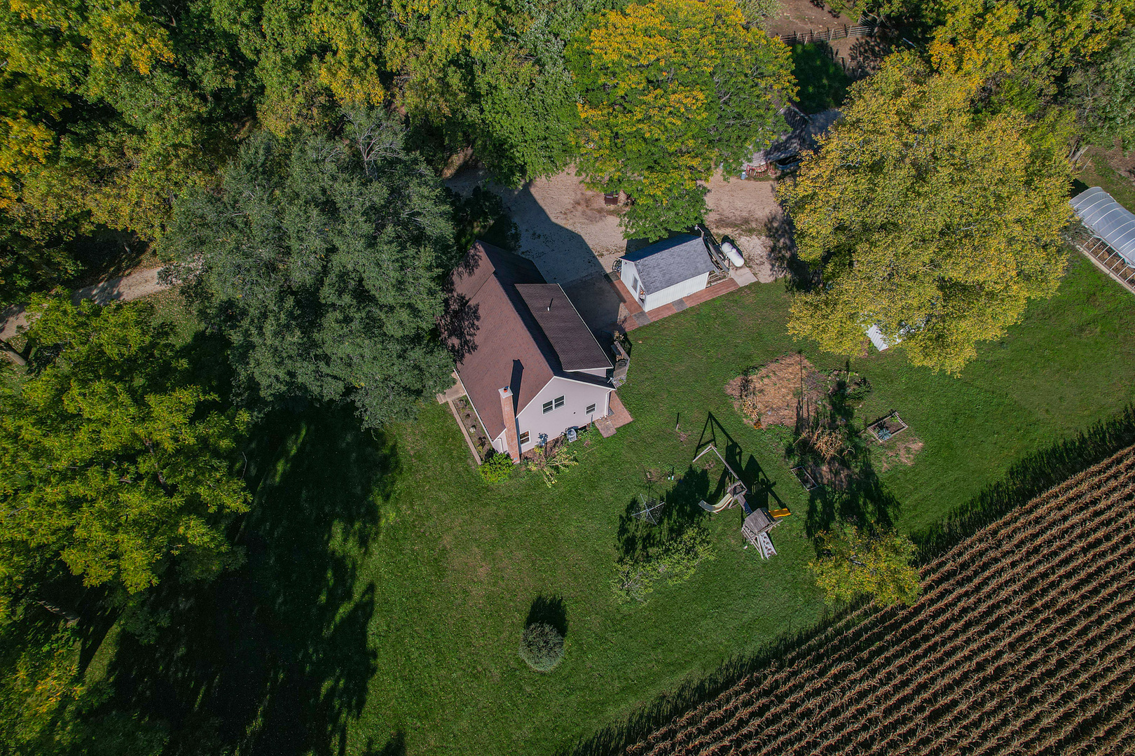 9282 East Hemstock Road Rochelle, IL 61068 - Photo 48 of 68 an aerial view of a house with a yard