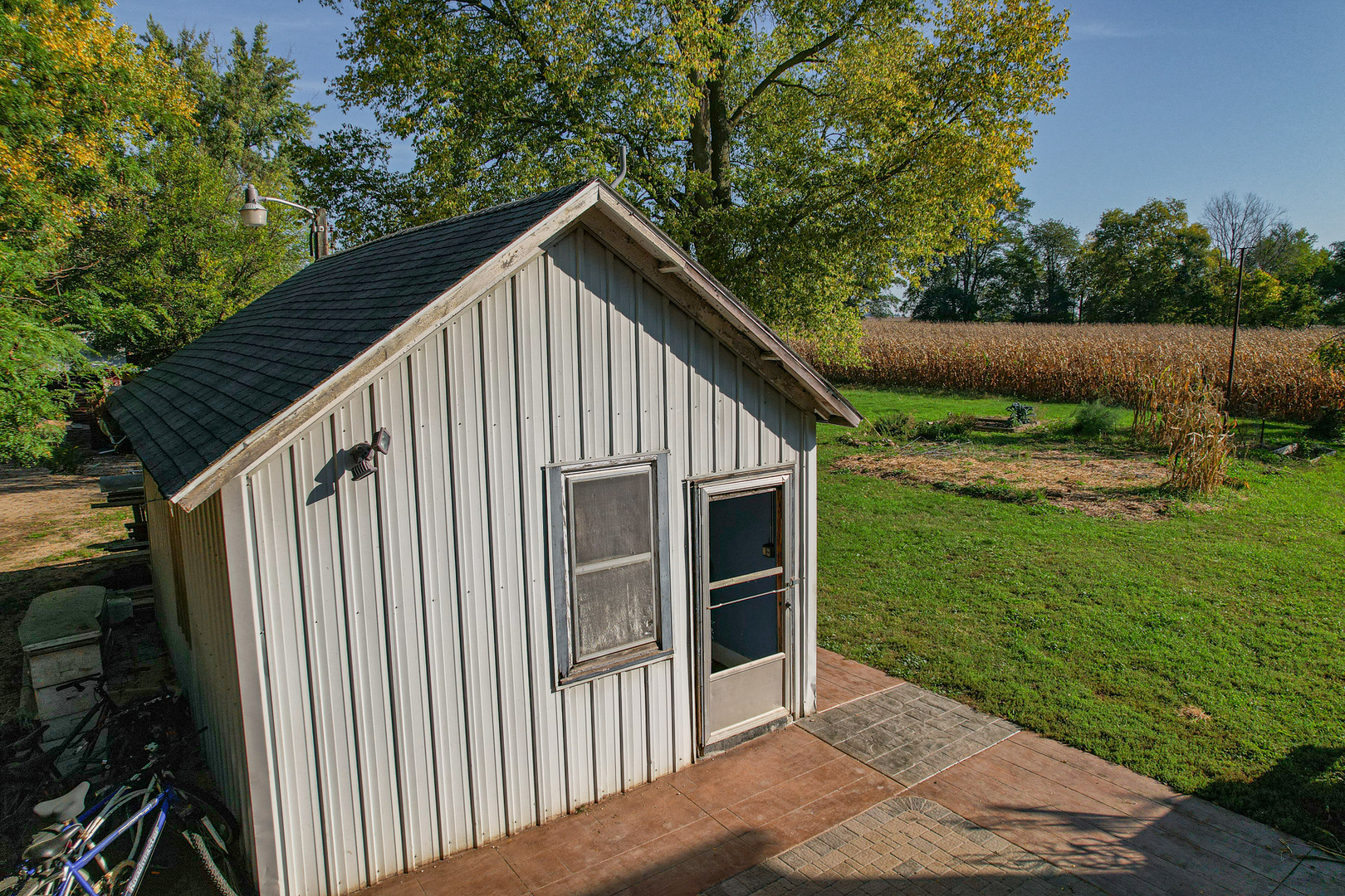 9282 East Hemstock Road Rochelle, IL 61068 - Photo 52 of 68 a view of backyard of house with wooden fence