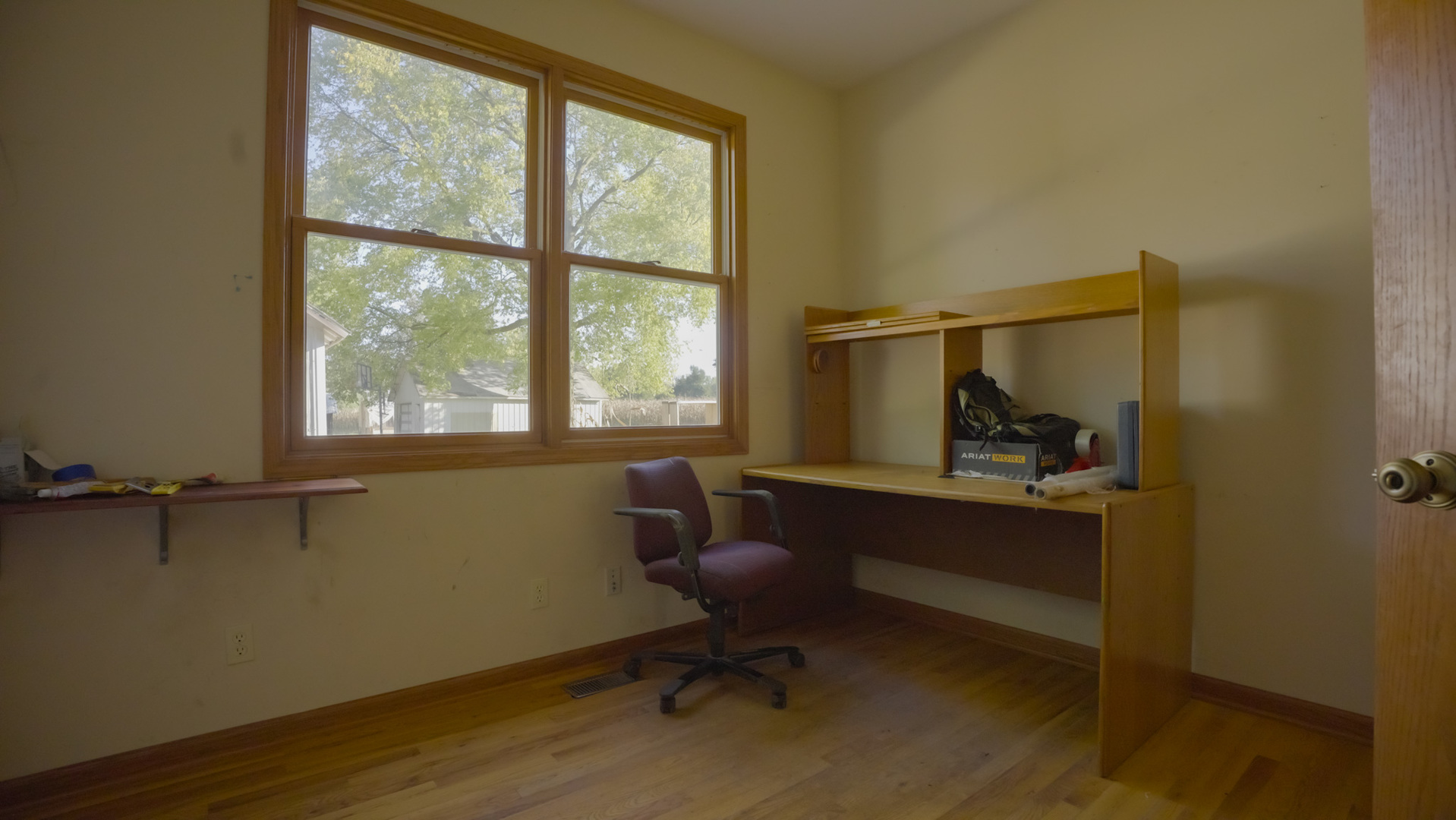 9282 East Hemstock Road Rochelle, IL 61068 - Photo 10 of 68 a view of a workspace with furniture and a window