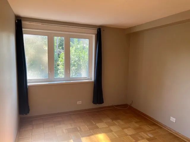a view of an empty room with window