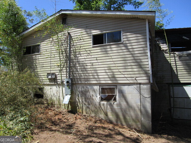 190 Youngblood Road Southeast Milledgeville, GA 31061 - Photo 23 of 37 a front view of a house with garden