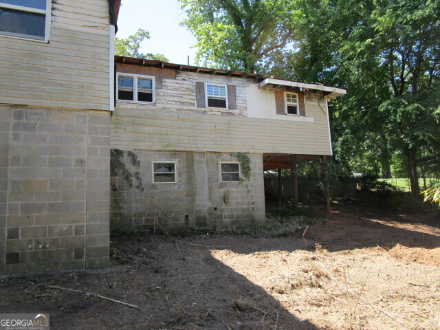 190 Youngblood Road Southeast Milledgeville, GA 31061 - Photo 27 of 37 a view of a backyard of the house