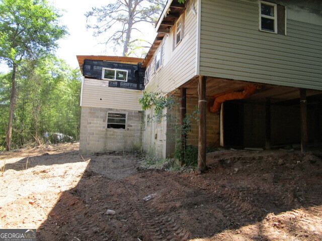 190 Youngblood Road Southeast Milledgeville, GA 31061 - Photo 28 of 37 a view of a house with a yard
