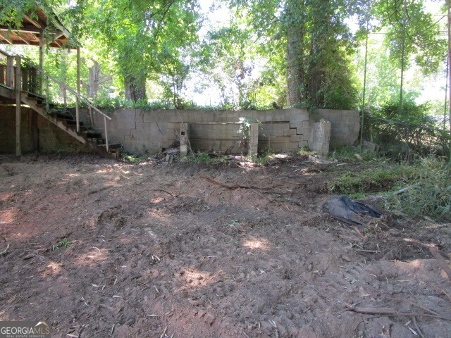 190 Youngblood Road Southeast Milledgeville, GA 31061 - Photo 30 of 37 a backyard of a house with lots of green space