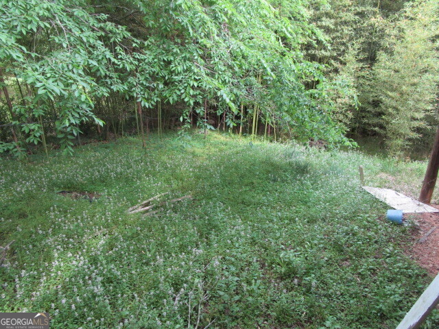 190 Youngblood Road Southeast Milledgeville, GA 31061 - Photo 4 of 37 a big yard with lots of green space and deers