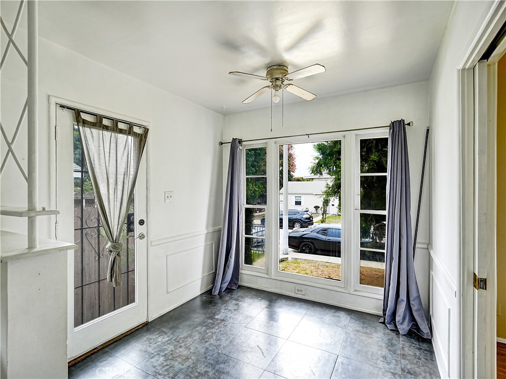 7928 Milton Avenue Whittier, CA 90602 - Photo 23 of 27 a view of an entryway with wooden floor and door