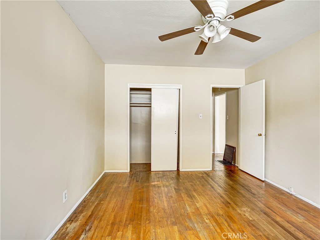 7928 Milton Avenue Whittier, CA 90602 - Photo 27 of 27 a view of empty room with wooden floor
