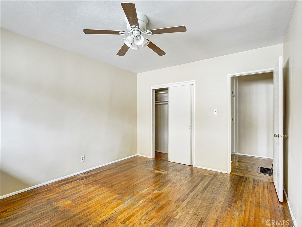 7928 Milton Avenue Whittier, CA 90602 - Photo 8 of 27 a view of empty room with wooden floor