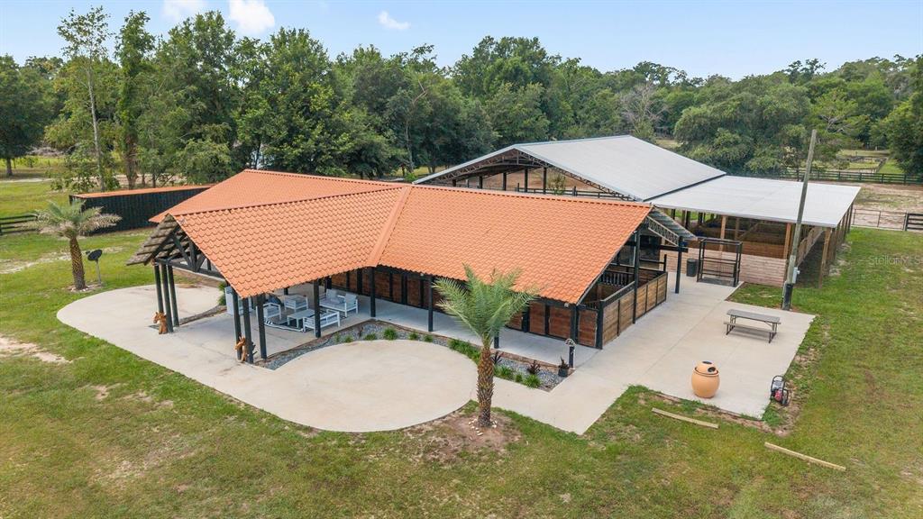 16392 Northeast Jacksonville Road Citra, FL 32113 - Photo 6 of 44 an aerial view of a house with backyard