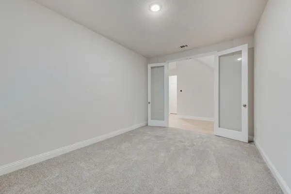 a view of an empty walk in closet