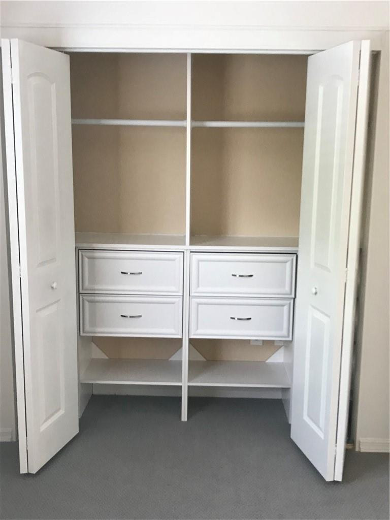 15038 Southwest 161st Place Miami, FL 33196 - Photo 20 of 23 a view of an empty walk in closet