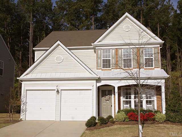 1617 October Road Raleigh, NC 27614 - Photo 1 of 9 a front view of a house with a yard