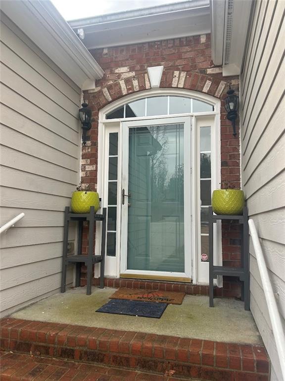 3220 Waterplace Cove Villa Rica, GA 30180 - Photo 2 of 36 a front view of a house with a porch