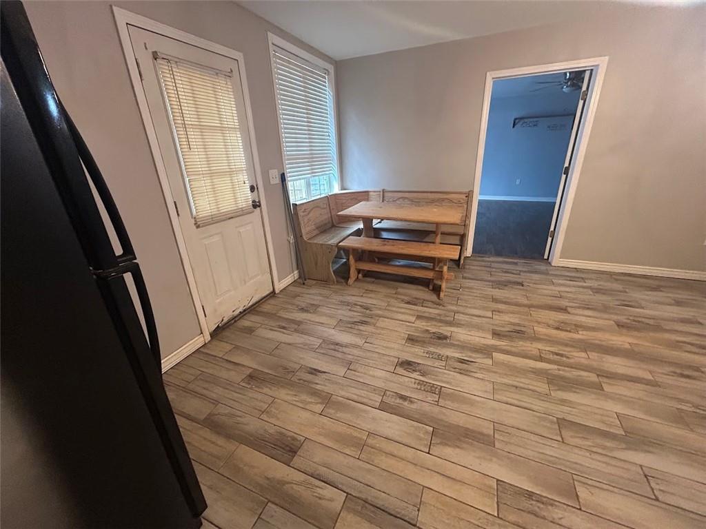 3220 Waterplace Cove Villa Rica, GA 30180 - Photo 23 of 36 a view of a room with wooden floor and window