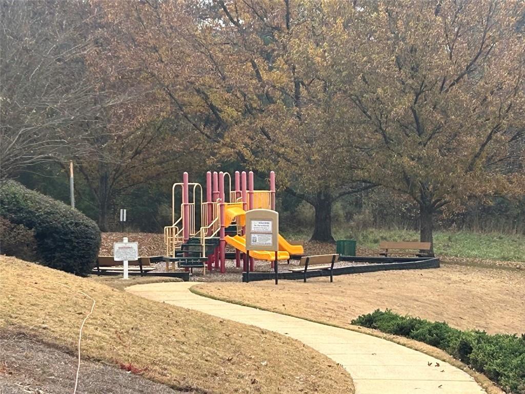 3220 Waterplace Cove Villa Rica, GA 30180 - Photo 35 of 36 a view of a park with slide