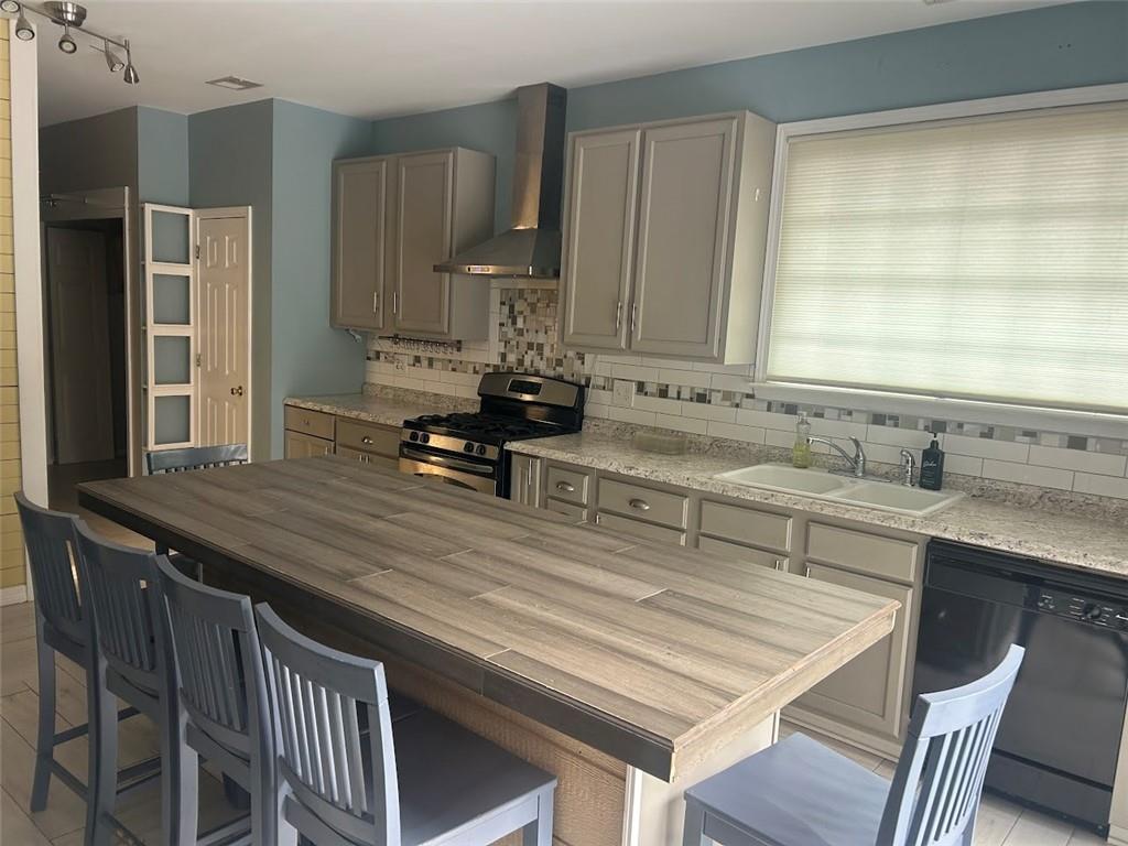 3220 Waterplace Cove Villa Rica, GA 30180 - Photo 6 of 36 a kitchen with a sink stove and cabinets