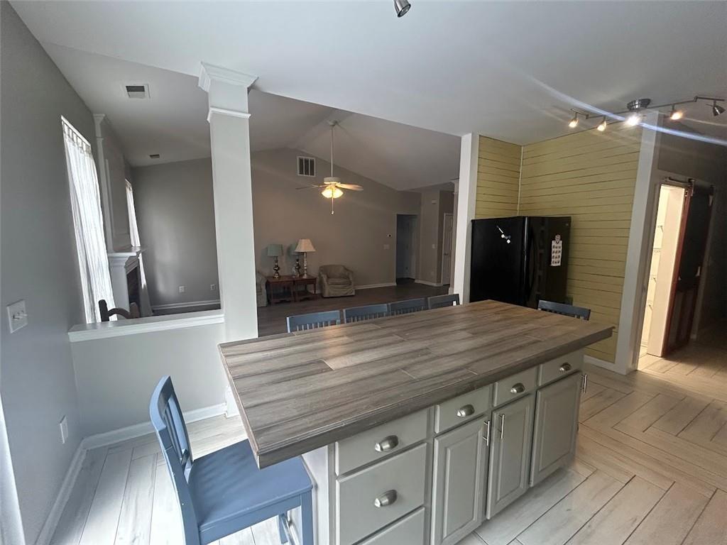 3220 Waterplace Cove Villa Rica, GA 30180 - Photo 9 of 36 a bathroom with a granite countertop sink a toilet and a mirror