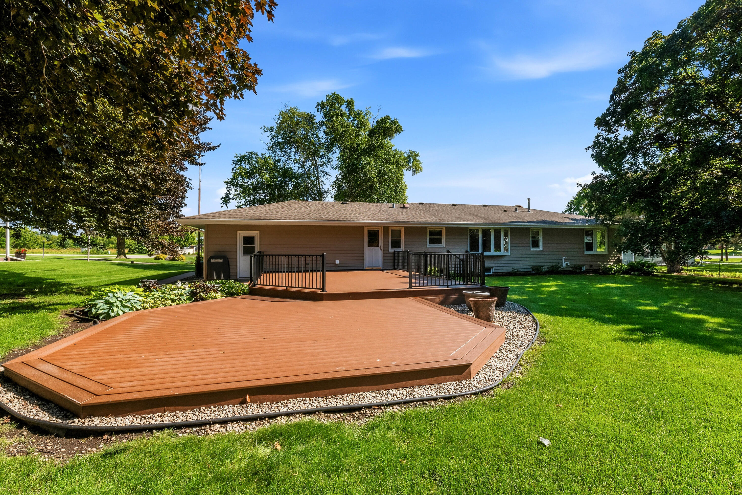 7631 West 5 Mile Road Raymond, WI 53126 - Photo 3 of 39 Brand new low maintenance deck!