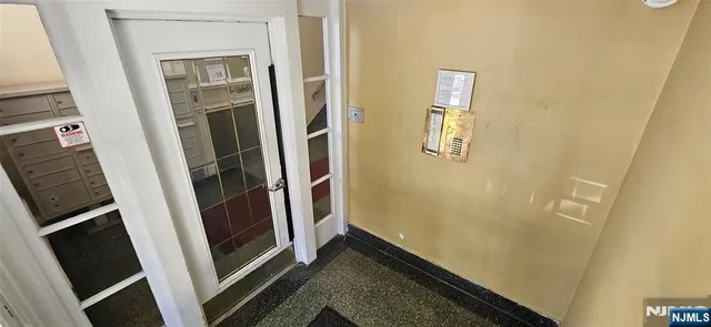 a view of multiple houses with a street