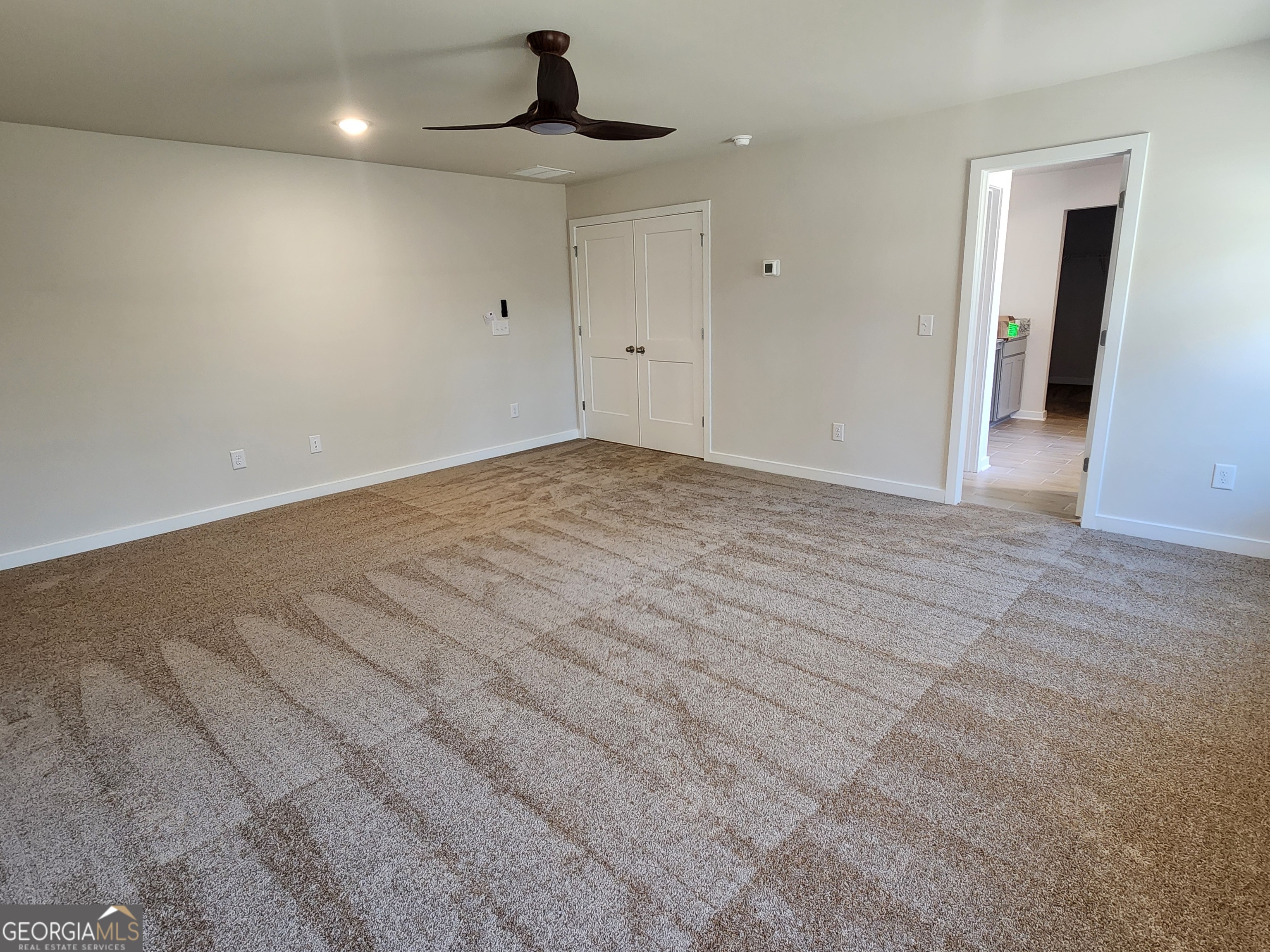 203 Crabapple Road, Unit 265 McDonough, GA 30253 - Photo 26 of 54 a view of an empty room