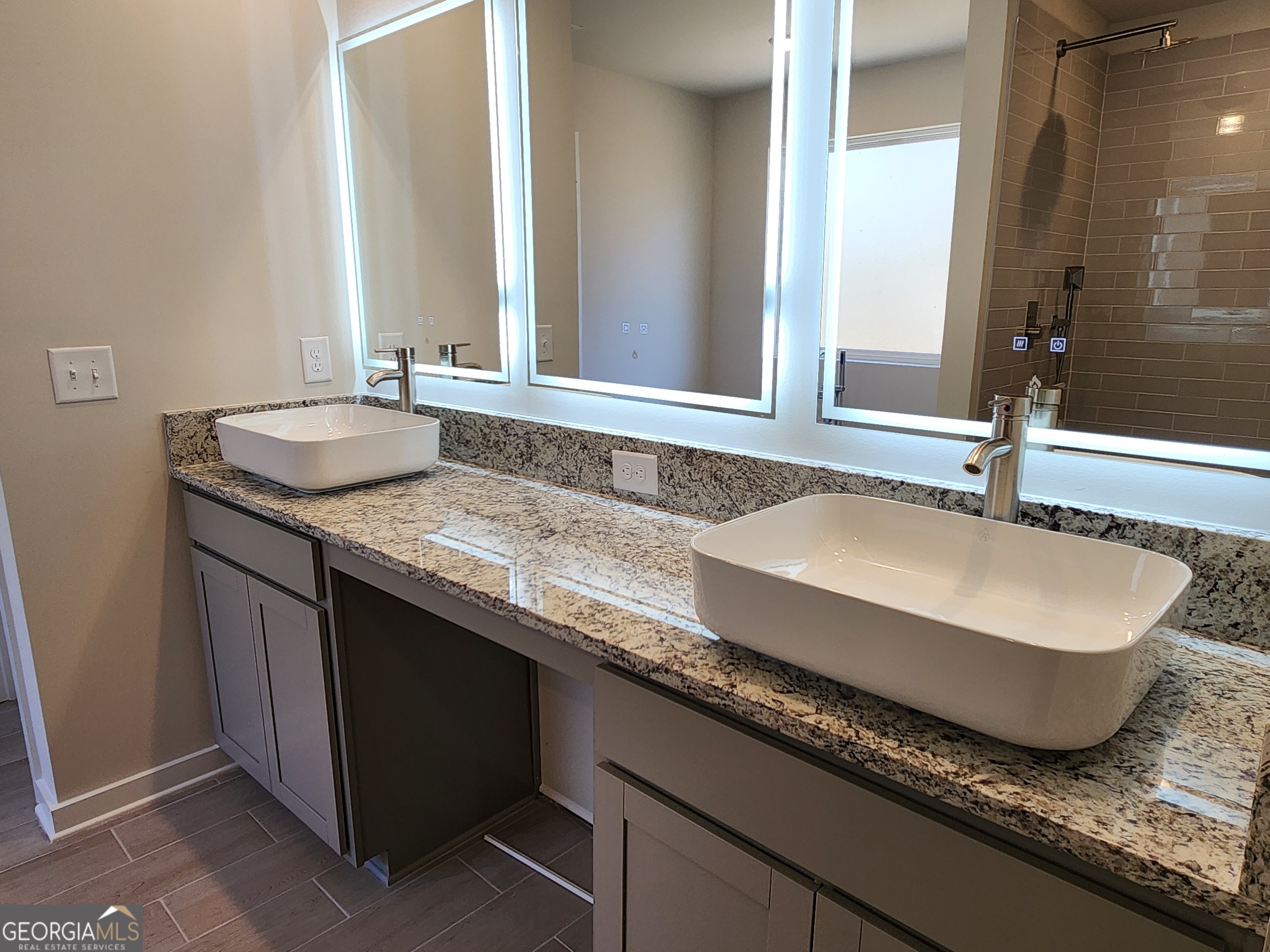 203 Crabapple Road, Unit 265 McDonough, GA 30253 - Photo 28 of 54 a bathroom with a granite countertop sink and a mirror