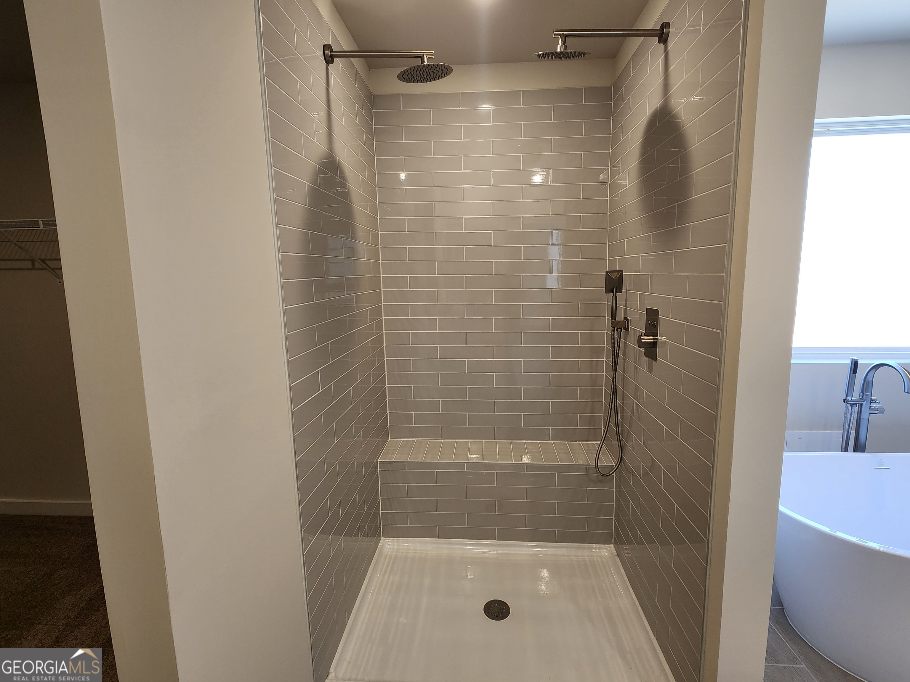 203 Crabapple Road, Unit 265 McDonough, GA 30253 - Photo 31 of 54 a bathroom with a shower and toilet