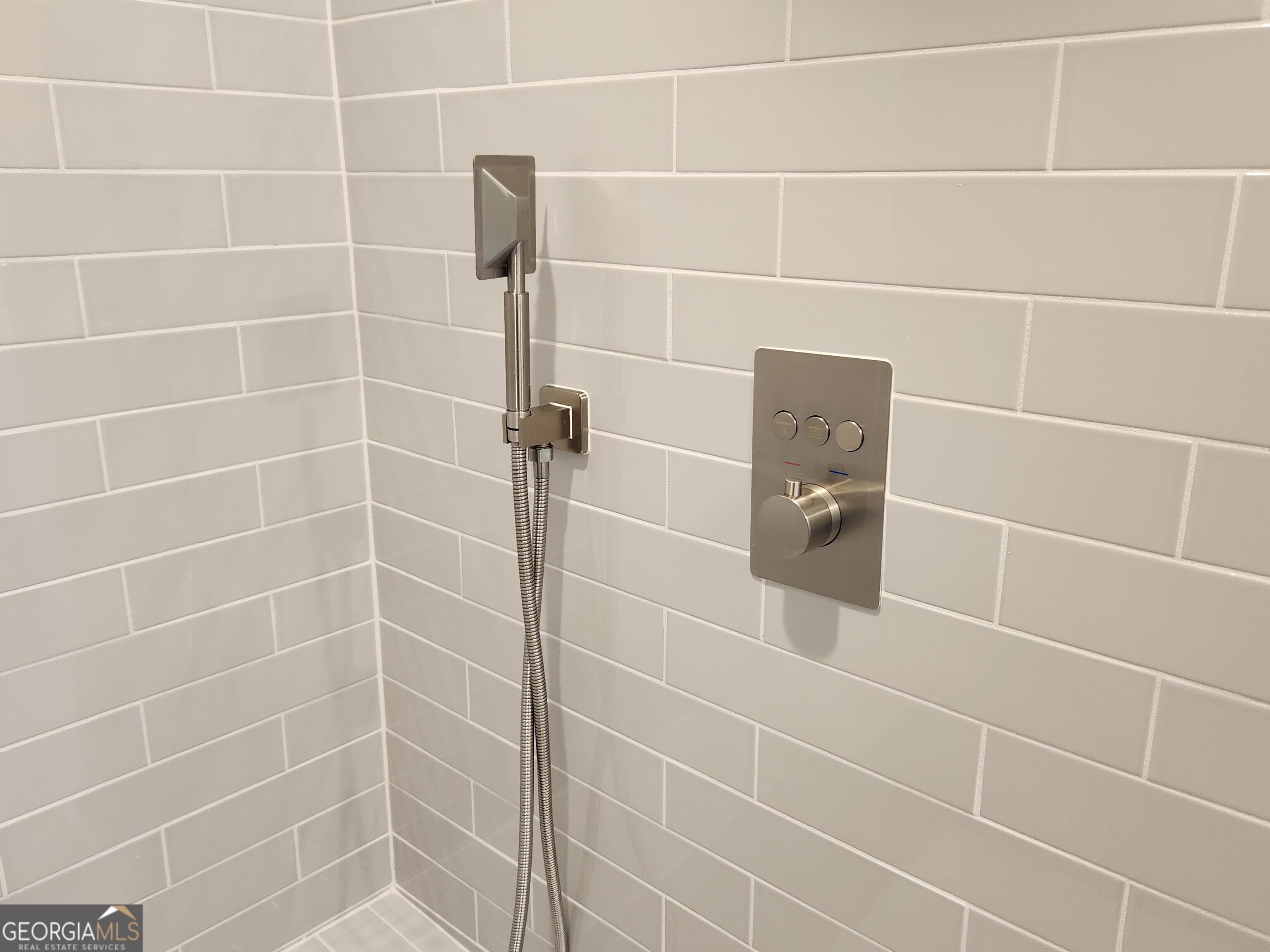 203 Crabapple Road, Unit 265 McDonough, GA 30253 - Photo 33 of 54 a bathroom with a shower