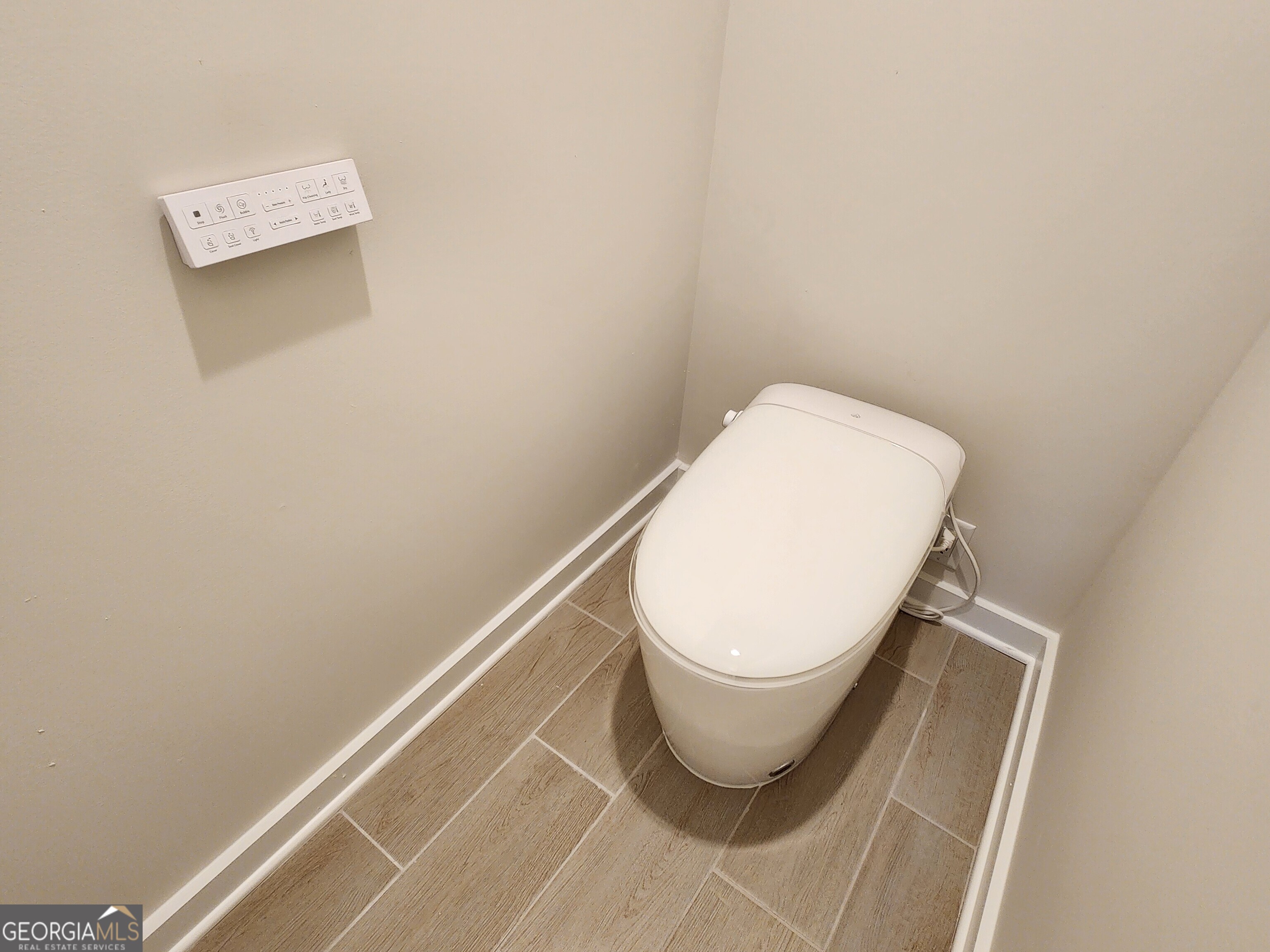 203 Crabapple Road, Unit 265 McDonough, GA 30253 - Photo 35 of 54 a close up of a toilet