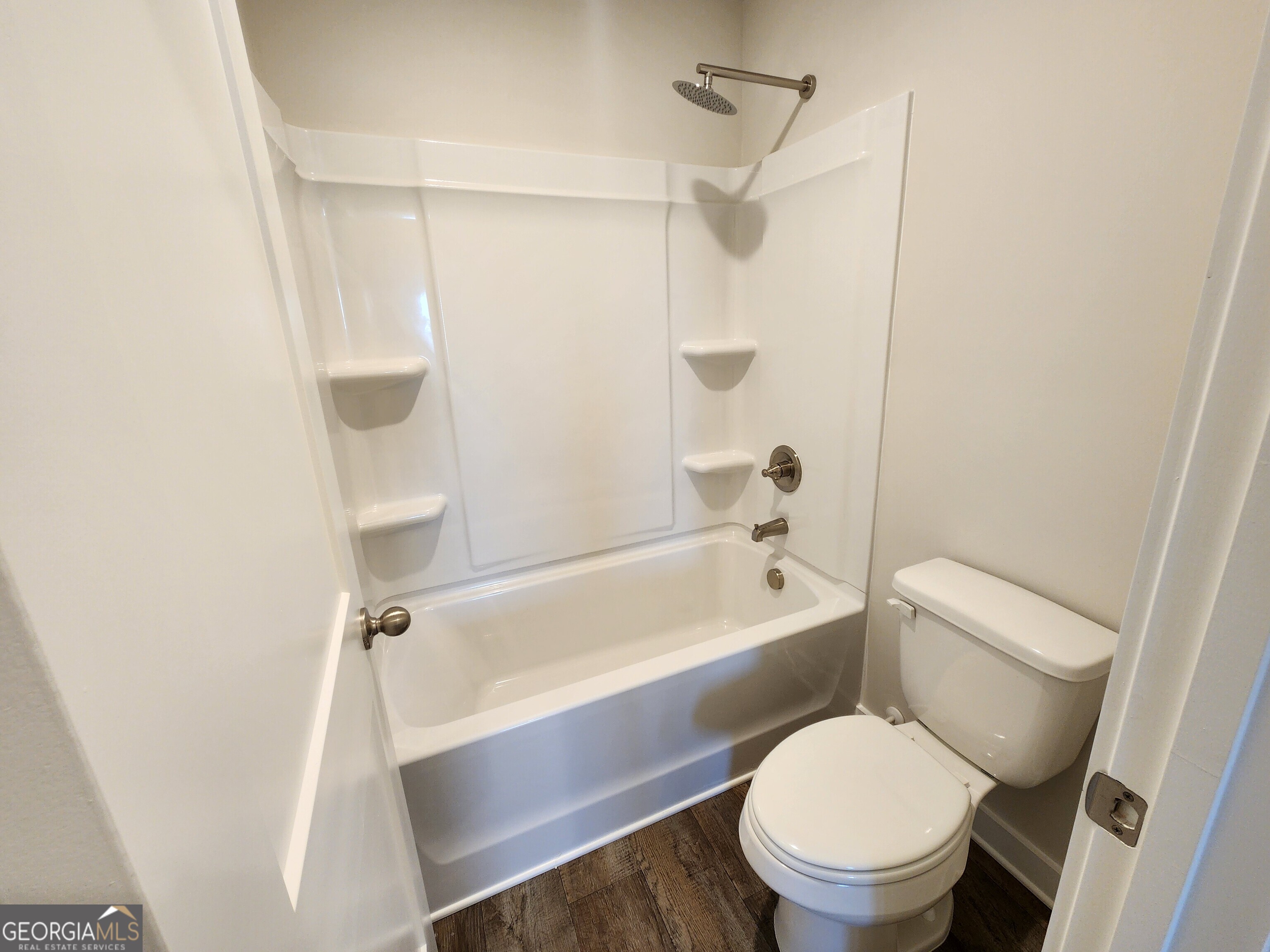 203 Crabapple Road, Unit 265 McDonough, GA 30253 - Photo 43 of 54 a white toilet sitting next to a bath tub