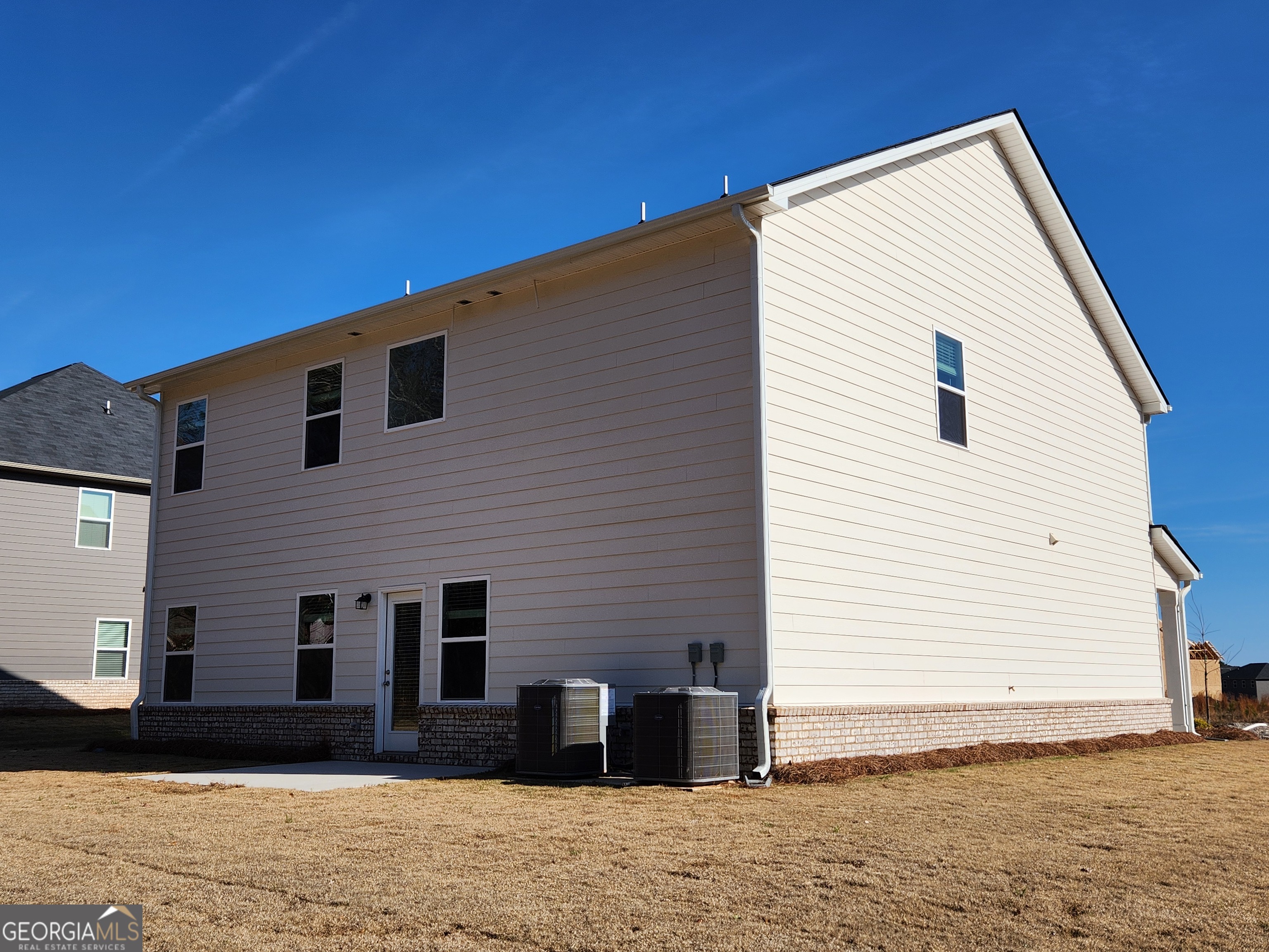 203 Crabapple Road, Unit 265 McDonough, GA 30253 - Photo 45 of 54 a view of a house with backyard