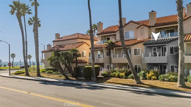 a front view of a building with street view
