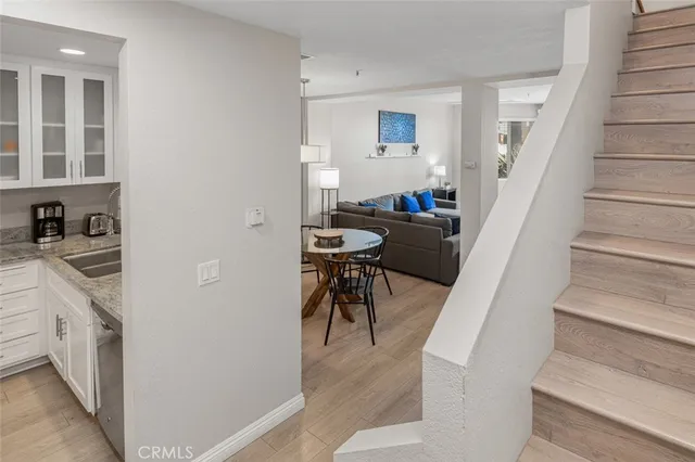 a view of a kitchen and dining room