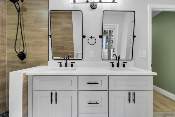 a bathroom with a sink and a mirror