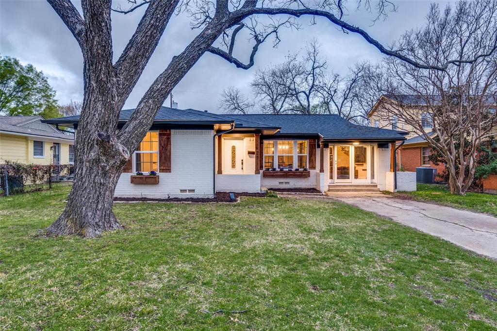 a house view with a garden space