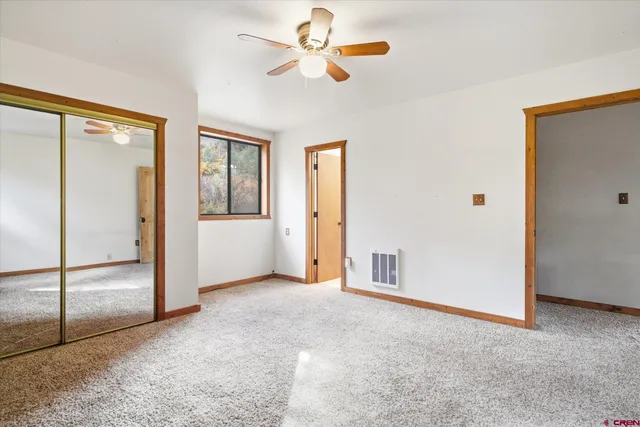 a bathroom with a sink toilet and vanity