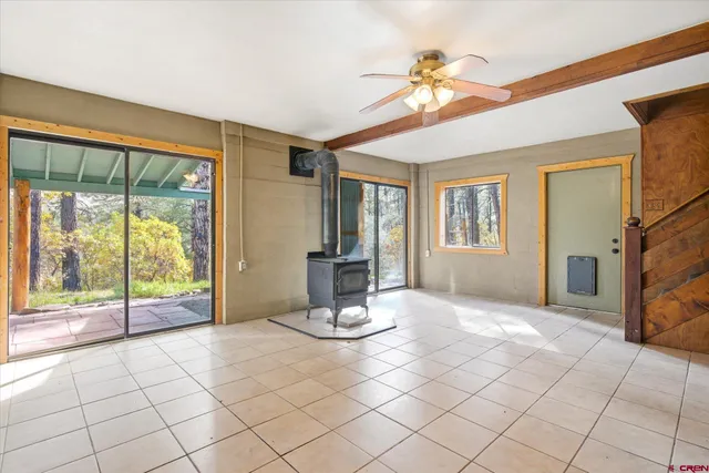a kitchen that has a sink and a white cabinets