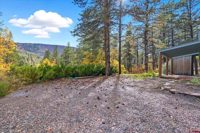a view of a houses with a yard