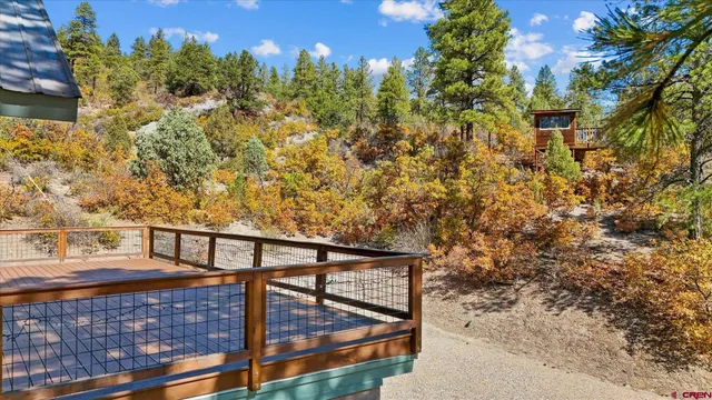 a view of house with yard