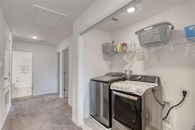 a bathroom with a sink double vanity granite and a mirror